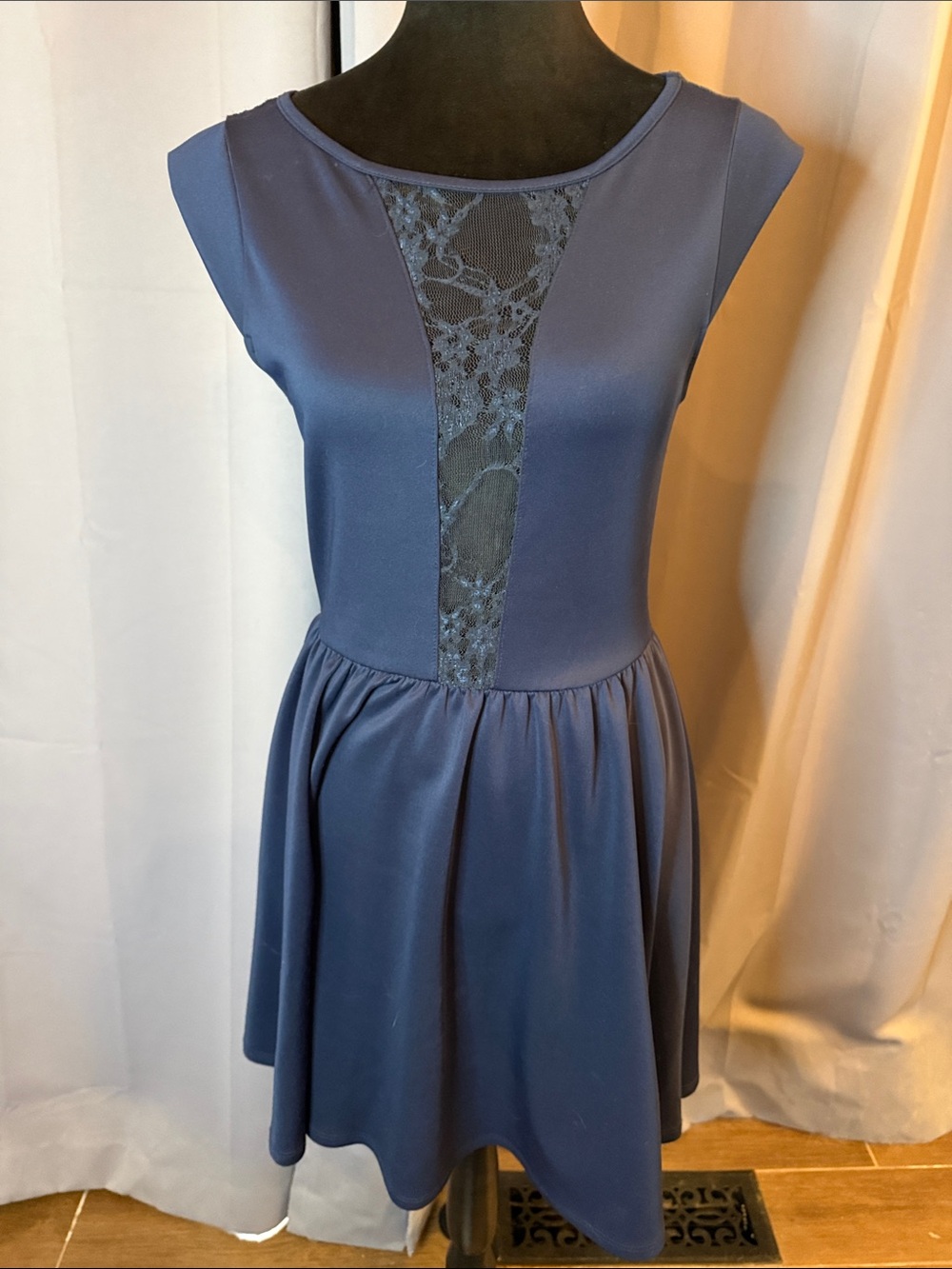Sleeveless Navy Lace-Insert Skater Dress from Charlotte Russe.